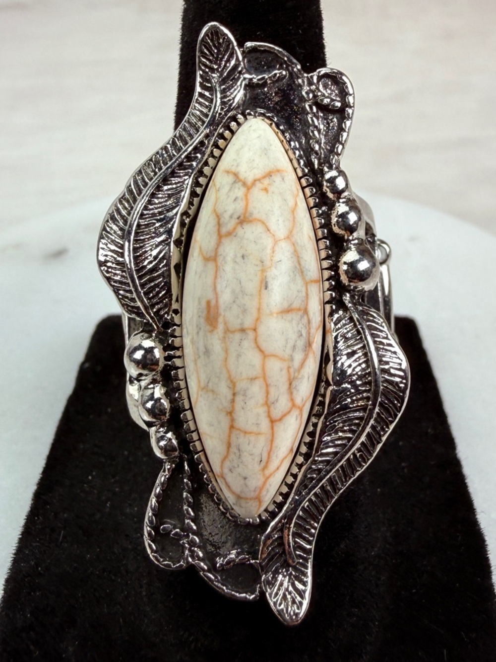 Beautiful, silvertone stretch, adjustable, long statement ring